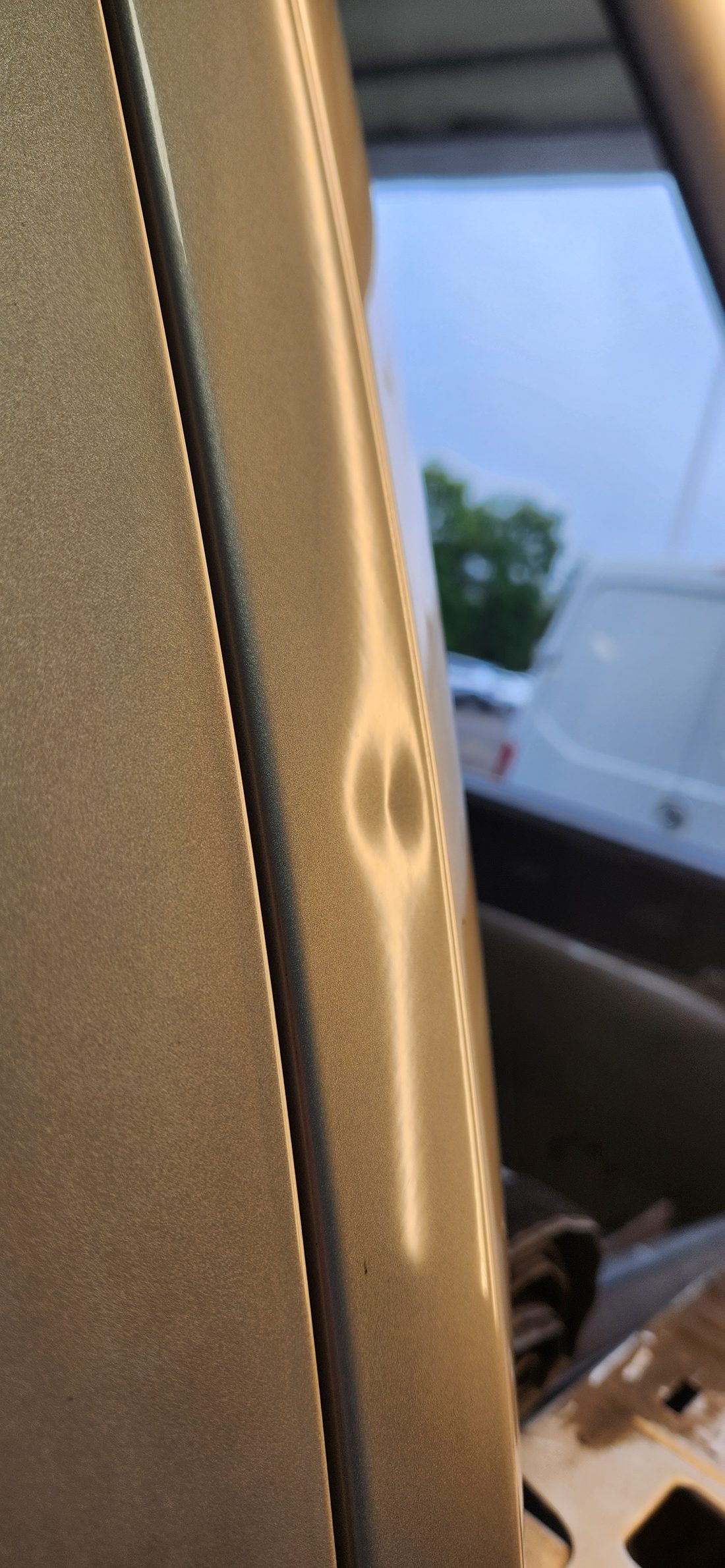 Same panel after paintless dent repair - Flawless Dents (example 8)