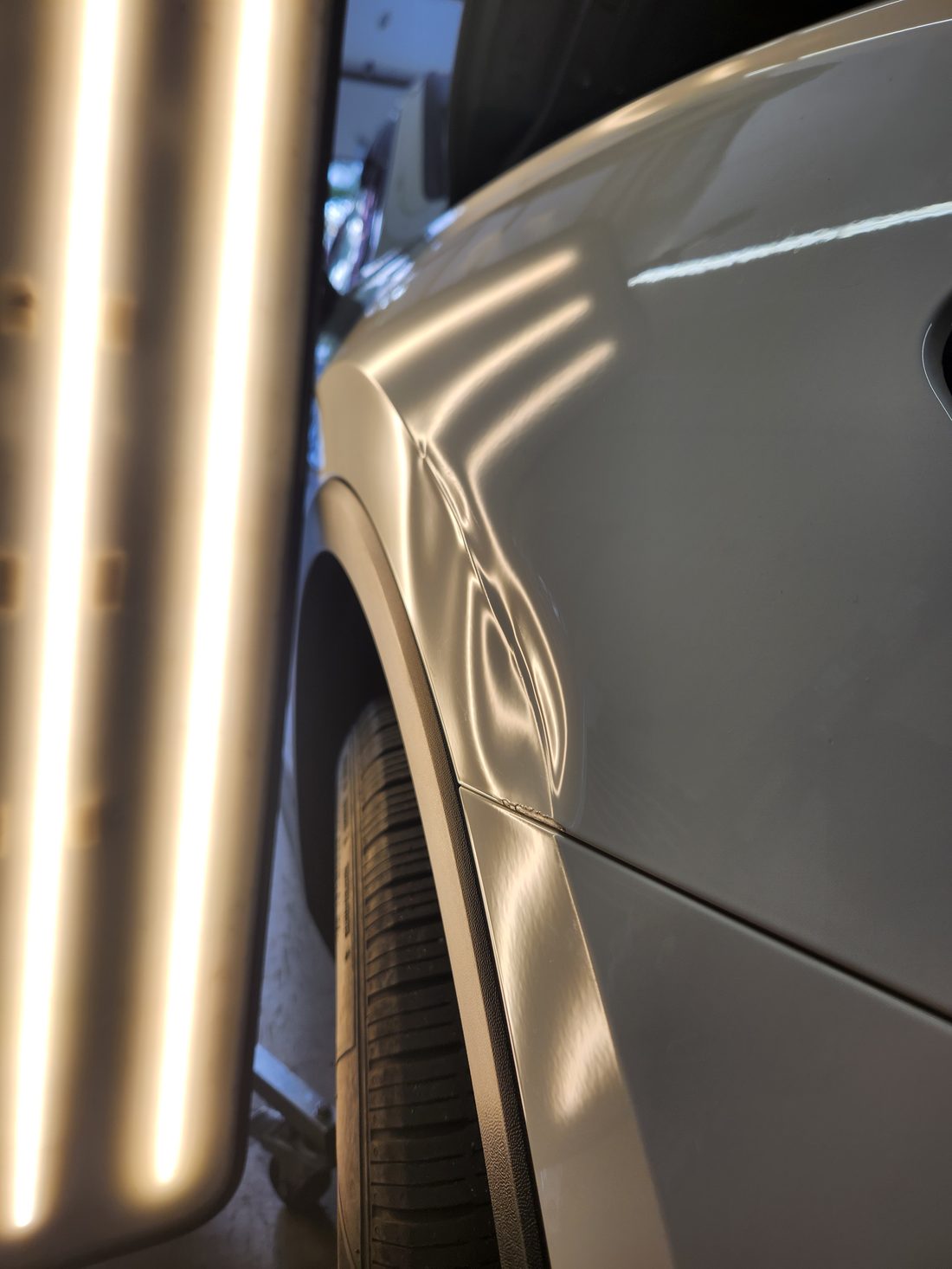 Dent before paintless dent repair - Flawless Dents (example 2)