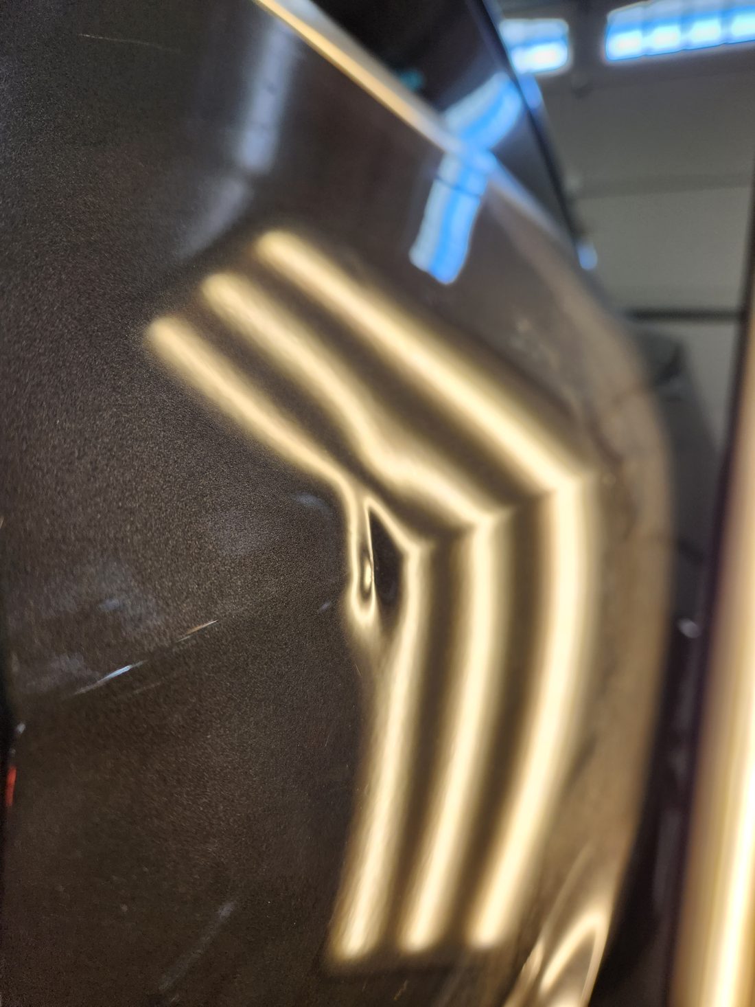 Dent before paintless dent repair - Flawless Dents (example 3)